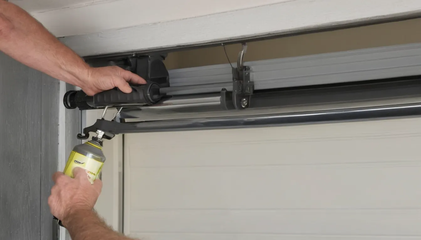Checking garage door tracks and rollers on a home in the Salem Lakes area